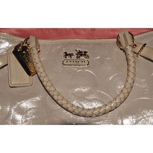 Luxury collection Coach bag. Rear champagne color.